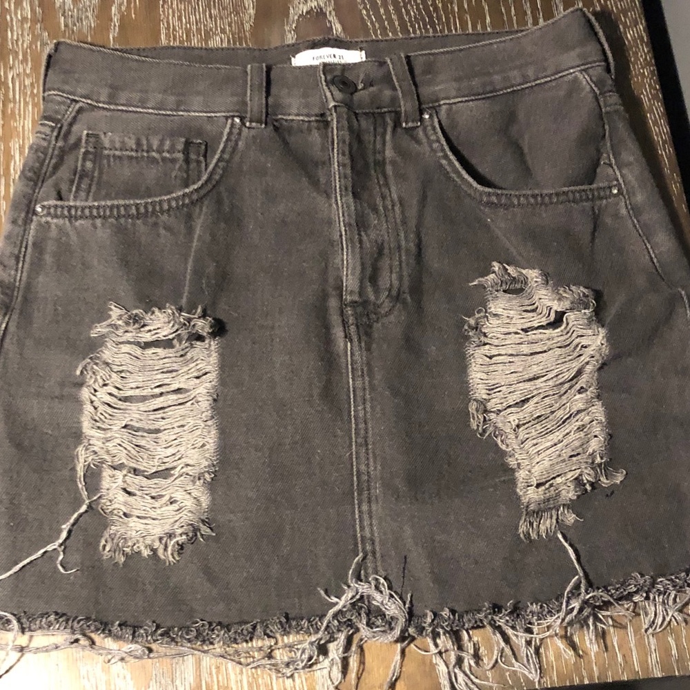 Distressed faded gray denim skirt